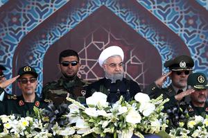 Iranian President Hassan Rouhani attends an armed forces parade in Tehran