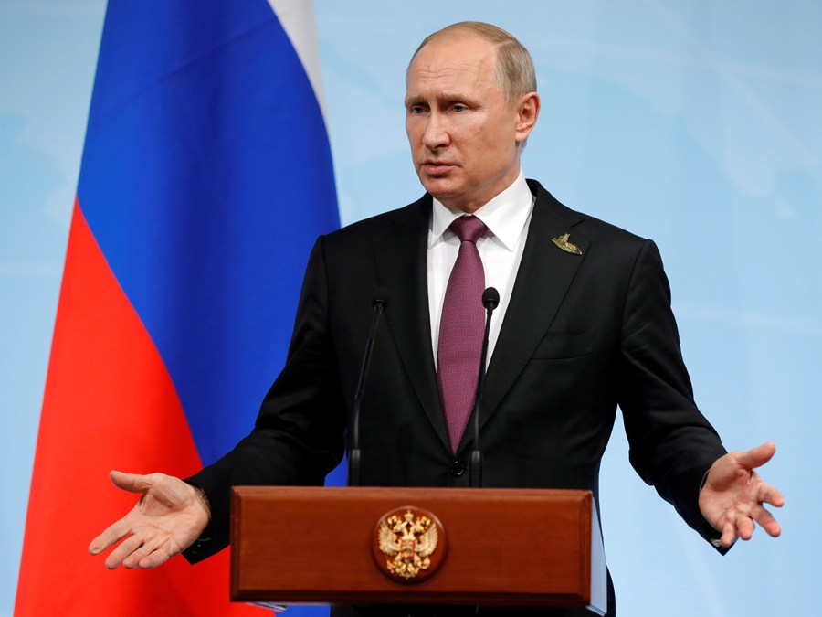 FILE PHOTO: Russian President Vladimir Putin speaks during a news conference after the G20 summit in Hamburg