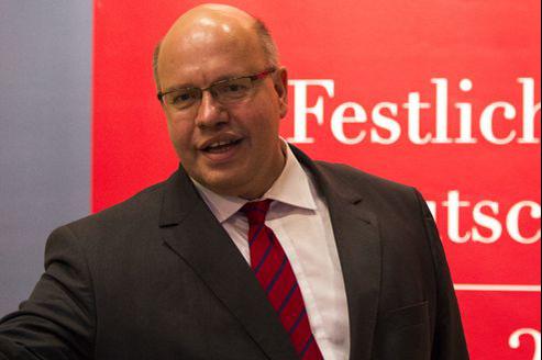 A presentation of new BDI president with Angela Merkel