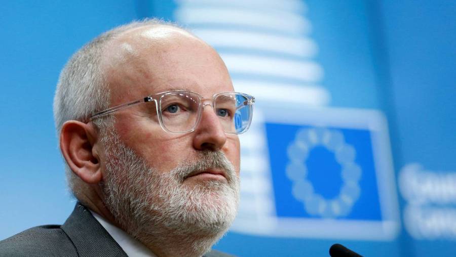 FILE PHOTO: European Commission First Vice-President Frans Timmermans addresses a news conference during a European Union's General Affairs Council in Brussels