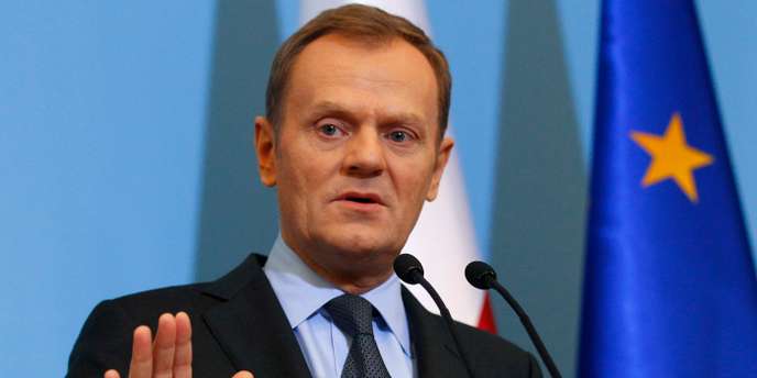 Poland's Prime Minister Tusk gestures as he announces members of new government during news conference one day before the inauguration of the new cabinet at Prime Minister Chancellery in Warsaw