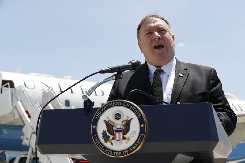 USA Secretary of State Mike Pompeo speaks to the media at Andrews Air Force Base, Md., Sunday, June 23, 2019, before boarding a plane headed to Jeddah, Saudi Arabia. (AP Photo-Jacquelyn Martin, Pool)800
