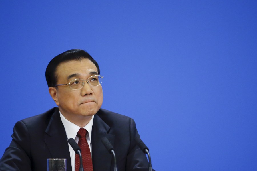 China's Premier Li Keqiang attends a news conference following the closing ceremony of China's National People's Congress at the Great Hall of the People in Beijing