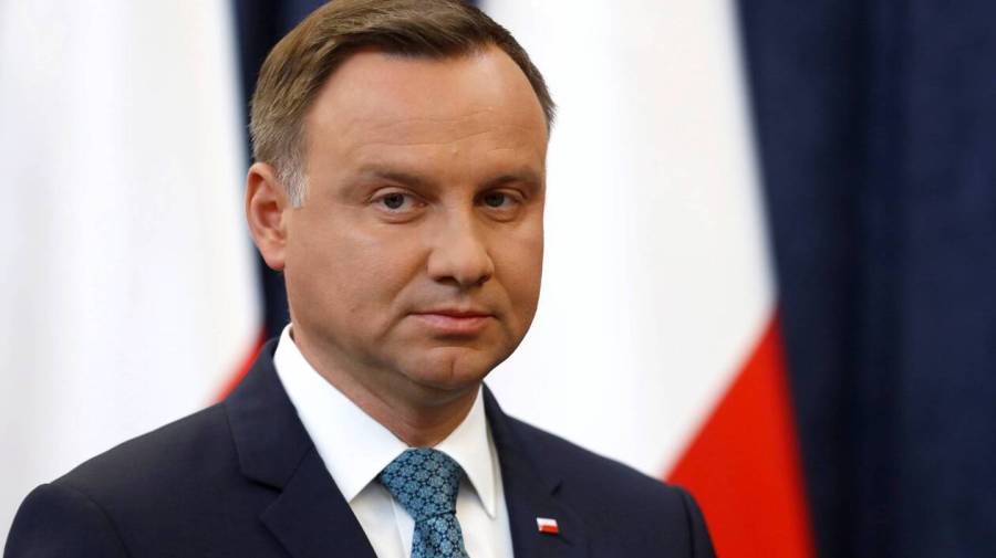 FILE PHOTO:Poland's President Duda looks on during his media announcement about Supreme Court legislation in Warsaw