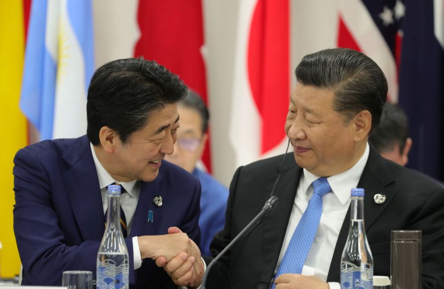 Japan's Prime Minister Shinzo Abe and China’s President Xi Jinping attend the G20 summit in Osaka