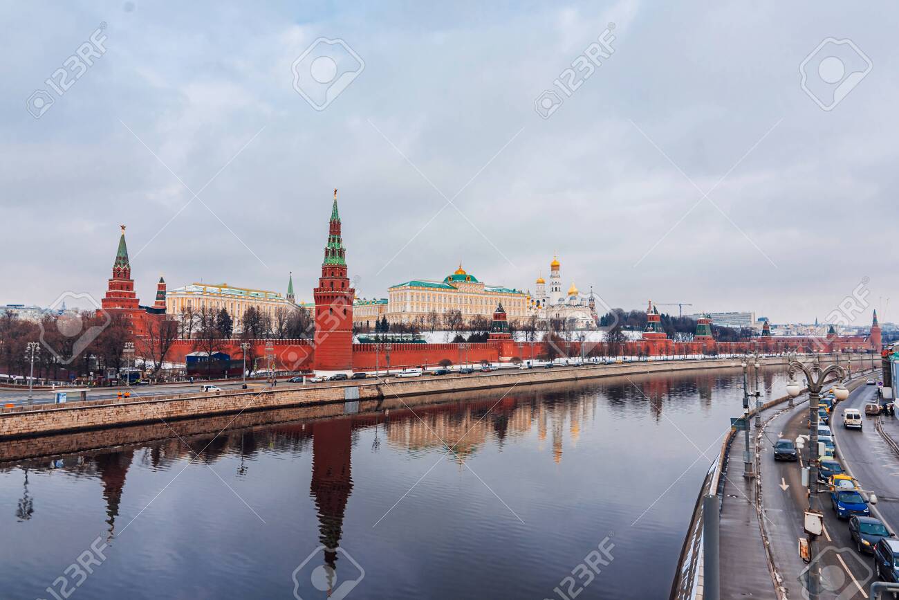 MOSCOW, RUSSIA - FEBRUARY 01, 2020: Urban landscape with views of the Kremlin wall and the Moscow river. The Grand Kremlin Palace, the Archangel Cathedral