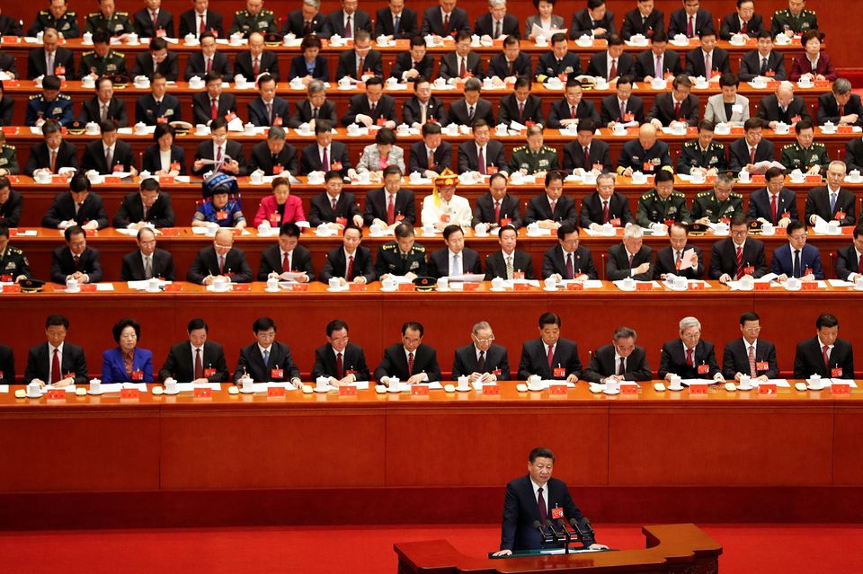 1065447-chinese-president-xi-jinping-delivers-his-speech-during-the-opening-session-of-the-19th-national-con