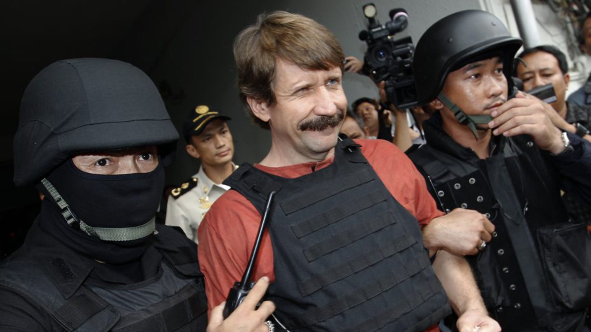 bout-is-escorted-by-members-of-a-special-police-unit-after-a-hearing-at-a-criminal-court-in-bangkok_578533