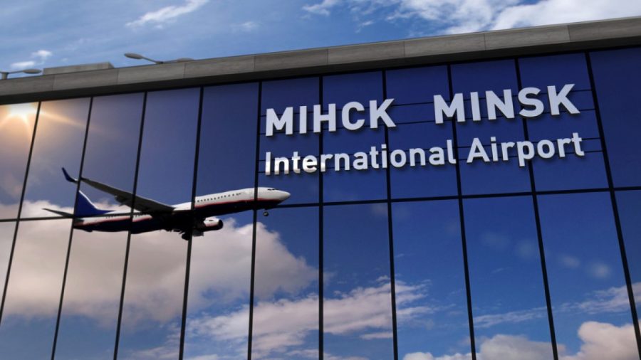 airplane-landing-at-minsk-mirrored-in-terminal-picture-id1215870593-1280x720